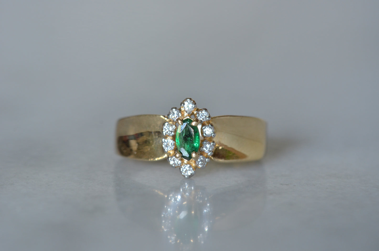 Striking Vintage Emerald Marquise Halo Ring
