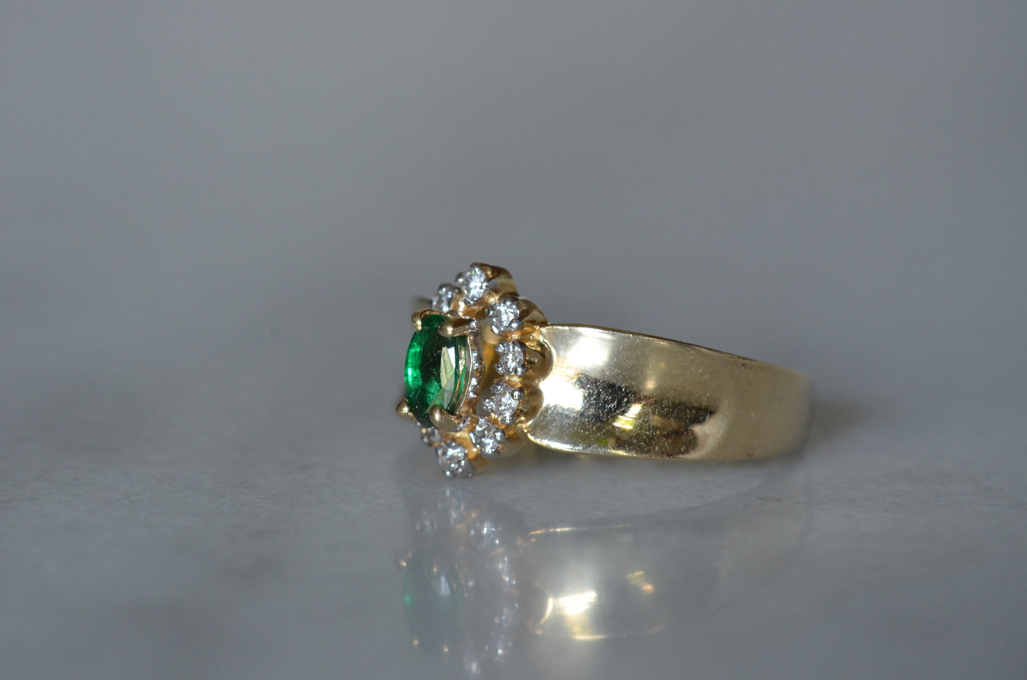 Striking Vintage Emerald Marquise Halo Ring