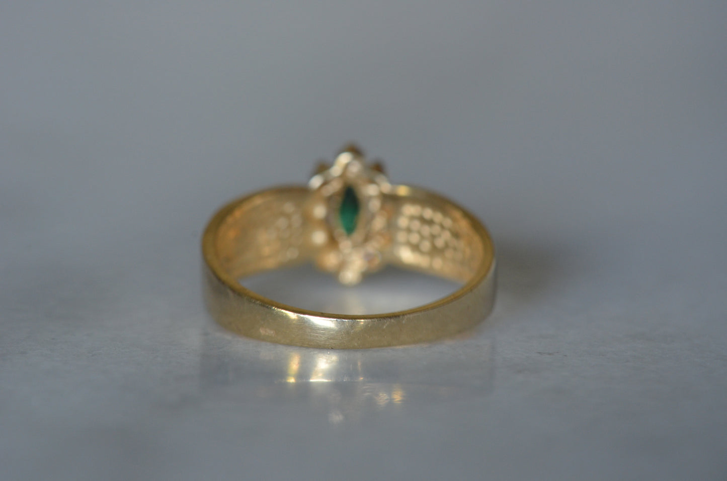 Striking Vintage Emerald Marquise Halo Ring