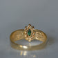 Striking Vintage Emerald Marquise Halo Ring