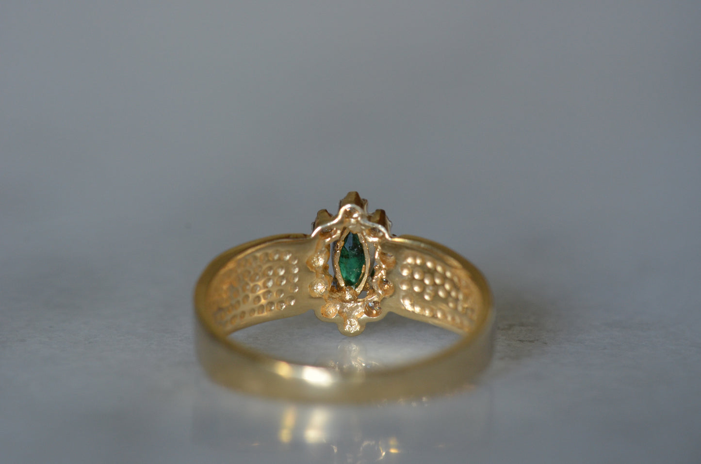 Striking Vintage Emerald Marquise Halo Ring