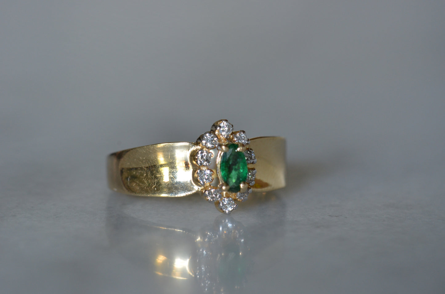 Striking Vintage Emerald Marquise Halo Ring