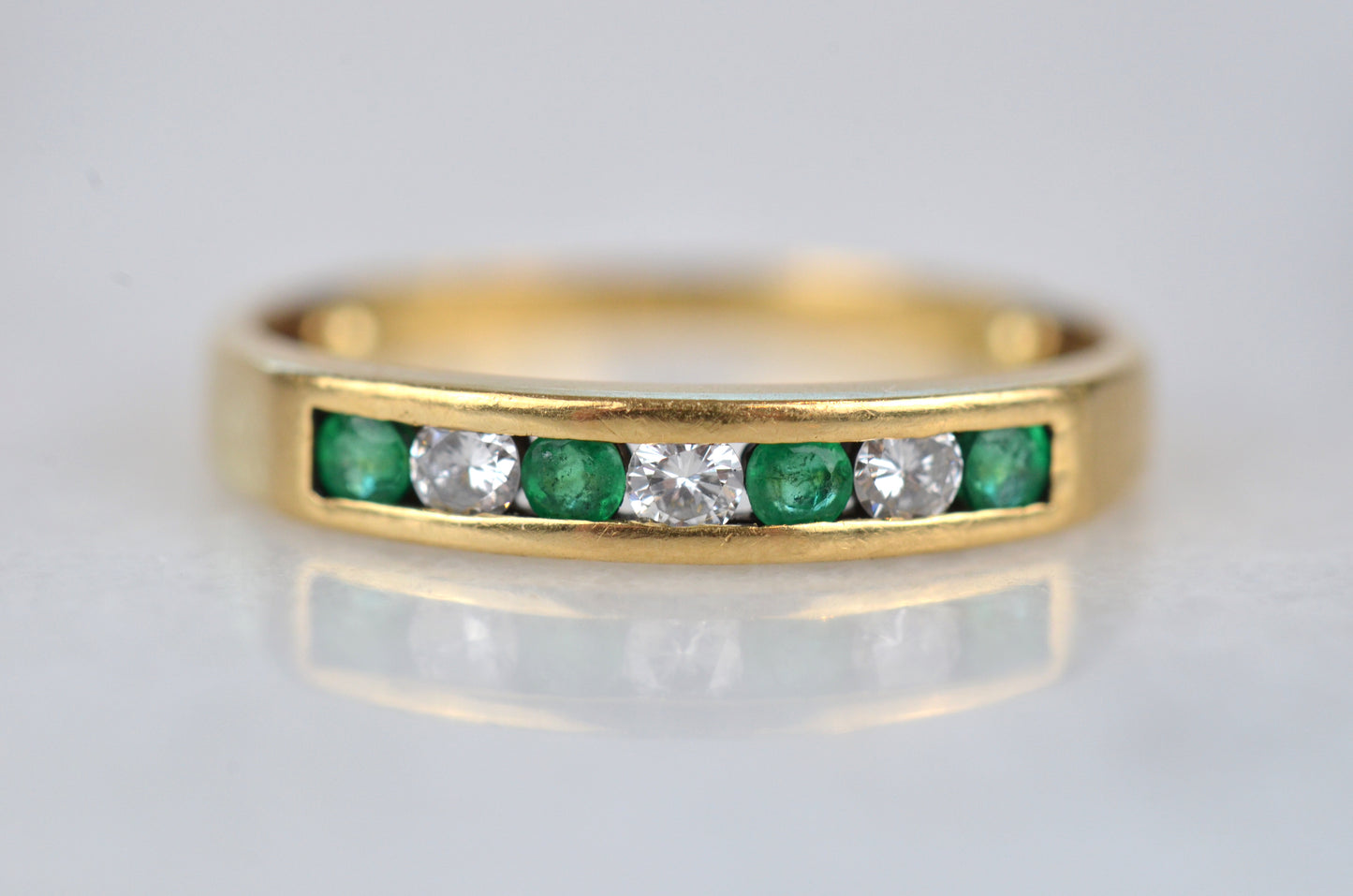 Sleek Vintage Diamond and Emerald Band