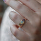 Smooth Antique Opal and Garnet Ring