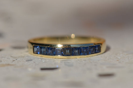 Sleek Vintage Sapphire Channel Band